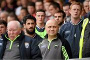 5 April 2015; Paul Galvin and Colm Cooper, right, on the Kerry substitutes bench during the national anthem. Allianz Football League, Division 1, Round 7, Tyrone v Kerry. Healy Park, Omagh, Co. Tyrone. Picture credit: Stephen McCarthy / SPORTSFILE