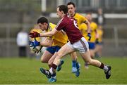 5 April 2015; Ciaráin Murtagh, Roscommmon, is tackled by John Gilligan, Westmeath. Allianz Football League, Division 2, Round 7, Westmeath v Roscommon. Cusack Park, Mullingar, Co. Westmeath. Picture credit: Ramsey Cardy / SPORTSFILE