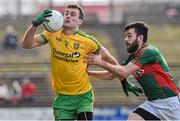 5 April 2015; Eamonn McGee, Donegal, in action against Kevin McLoughlin, Mayo. Allianz Football League, Division 1, Round 7, Mayo v Donegal. Elverys MacHale Park, Castlebar, Co. Mayo. Picture credit: David Maher / SPORTSFILE