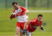 5 April 2015; Mark Lynch, Derry, in action against Conor Dorman, Cork. Allianz Football League, Division 1, Round 7, Derry v Cork. Owenbeg, Derry. Picture credit: Oliver McVeigh / SPORTSFILE