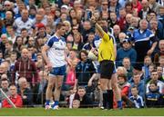 5 April 2015; Dessie Mone, left, Monaghan, is shown a black card by referee Maurice Deegan. Allianz Football League, Division 1, Round 7, Monaghan v Dublin. St Tiernach’s Park, Clones, Co. Monaghan. Picture credit: Brendan Moran / SPORTSFILE