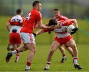 5 April 2015; Kevin Johnston, Derry, in action against Paul Kerrigan, Cork. Allianz Football League, Division 1, Round 7, Derry v Cork. Owenbeg, Derry. Picture credit: Oliver McVeigh / SPORTSFILE