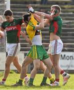 5 April 2015; Ryan McHugh, Donegal, tussles with  Mayo's Kevin Keane, at the end of the game after his team-mate Stephen Griffen, had scored a point resulting in Donegal reaching the Allianz Football League, Division 1 semi final. Allianz Football League, Division 1, Round 7, Mayo v Donegal. Elverys MacHale Park, Castlebar, Co. Mayo. Picture credit: David Maher / SPORTSFILE