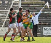 5 April 2015; Mark McHugh, Donegal, tussles with  Mayo's Kevin Keane, at the end of the game after his team-mate Stephen Griffen, had scored a point resulting in Donegal reaching the Allianz Football League, Division 1 semi final. Allianz Football League, Division 1, Round 7, Mayo v Donegal. Elverys MacHale Park, Castlebar, Co. Mayo. Picture credit: David Maher / SPORTSFILE