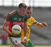 5 April 2015; Danny Kirby, Mayo, in action against Karl Lacey, Donegal. Allianz Football League, Division 1, Round 7, Mayo v Donegal. Elverys MacHale Park, Castlebar, Co. Mayo. Picture credit: David Maher / SPORTSFILE