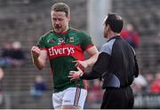 5 April 2015; A bloodied Andy Moran, Mayo, with referee David Coldrick, before leaving the pitch to receive medical attention. Allianz Football League, Division 1, Round 7, Mayo v Donegal. Elverys MacHale Park, Castlebar, Co. Mayo. Picture credit: David Maher / SPORTSFILE