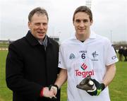 19 April 2008; Martin McCann from Cadbury presents Gary White, Kildare, with the Cadbury Hero of the Match Award. Gary is now short listed for the 2008 Cadbury Hero of the Future Award which takes place in Dublin on May 29th. To vote for him log on to www.cadburygaau21.com. Cadbury All-Ireland U21 Football Championship Semi-Final, Down v Kildare, Pairc Tailteann, Navan, Co. Meath. Photo by Sportsfile  *** Local Caption ***