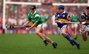 15 June 1997; Barry Foley of Limerick in action against John Leahy of Tipperary during the Munster GAA Senior Hurling Championship Semi-Final match between Tipperary and Limerick at Semple Stadium in Thurles, Co Tipperary. Photo by Ray McManus/Sportsfile
