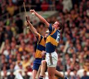 14 September 1997; Brian O'Meara of Tipperary in action against Michael O'Halloran of Clare during the Guinness All-Ireland Senior Hurling Championship Final between Clare and Tipperary at Croke Park in Dublin. Photo by Ray McManus/Sportsfile