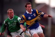 13 April 1997; Brian O'Meara of Tipperary in action against Dave Clarke of Limerick during the National Hurling League Division 1 match between Limerick v Tipperary at the Gaelic Grounds in Limerick. Photo by Brendan Moran/Sportsfile