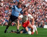 17 September 1995; Charlie Redmond of Dublin holds off Paul Devlin of Tyrone to score the only goal during the GAA Football All-Ireland Senior Champtionship Final match between Dublin and Tyrone at Croke Park in Dublin. Photo by Brendan Moran/Sportsfile