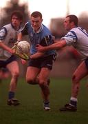 15 February 1998; Ciaran Whelan of Dublin breaks clear from Kevin Hughes of Monaghan during the Church & General National Football League match between Dublin and Monaghan at Parnell Park in Dublin. Photo by Brendan Moran/Sportsfile