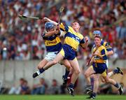 14 September 1997; Fergus Tuohy of Clare in action against Colm Bonnar of Tipperary during the GAA Munster Senior Hurling Championship Final match between Clare and Tipperary at Páirc Uí Chaoimh, Cork. Photo by Ray McManus/Sportsfile