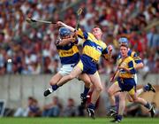6 July 1997; fergus Touhy of Clare in action against Colm Bonner of Tipperary during the Guinness Munster Senior Hurling Championship Final match between Clare and Tipperary at Páirc Uí Chaoimh in Cork. Photo by Ray McManus/Sportsfile