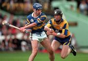 14 September 1997; Conal Bonnar of Tipperary in action against Niall Gilligan of Clare during the Guinness All Ireland Hurling Final match between Clare and Tipperary at Croke Park in Dublin. Photo by Matt Browne/Sportsfile