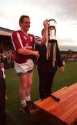 12 July 1997; Galway captain Joe Cooney receives the cup following the Guinness Connacht Senior Hurling Championship Final match between Roscommon and Galway at Athleague in Roscommon. Photo by Brendan Moran/Sportsfile