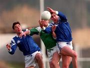 25 January 1998; Darragh O'Sé of Munster supported by team-mate Derry Foley in a race for possession against Niall Buckley of Leinster during the Interprovincial Railway Cup Football Championship Semi-Final match between Munster and Leinster at Fitzgerald Stadium in Killarney, Kerry. Photo by Ray McManus/Sportsfile