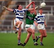 22 February 1998; Eddie Barr of Erin's Isle in action against Liam O'Connell of Castlehaven during the AIB All-Ireland Club Senior Football Semi-Final match between Erin's Isle and Castlehaven at Semple Stadium in Thurles, Tipperary. Photo by Ray McManus/Sportsfile