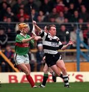 C15 February 1998; Fergus Tuohy of Clarecastle in action against Naill Claffet of Birr during the AIB All-Ireland Club Hurling Championship Semi-Final match between Birr and Clarecastle at Semple Stadium in Thurles Tipperary. Photo by Ray McManus/Sportsfile