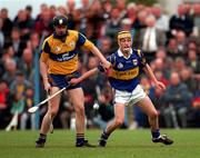 10 May 1997; Frank Lohan of Clare in action against Liam Cahill of Tipperary during the National Hurling League Division 1 match between Clare and Tipperary at Cusack Park in Ennis. Photo by Ray McManus/Sportsfile