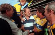 14 September 1997; Clare manager Ger Loughnane celebrates with supporters after the Guinness All Ireland Hurling Final match between Clare and Tipperary at Croke Park in Dublin. Photo by Ray McManus/Sportsfile