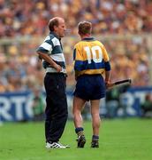 14 September 1997; Clare manager Ger Loughnane enters the field to speak with James O'Connor of Clare during the Guinness All-Ireland Senior Hurling Championship Final between Clare and Tipperary at Croke Park in Dublin. Photo by Ray McManus/Sportsfile