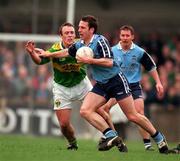 15 March 1998; Ian Robertson of Dublin in action against John Crowley of Kerry during the National Football League Section C match between Dublin and Kerry at Parnell Park in Dublin. Photo by Brendan Moran/Sportsfile