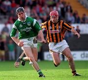 24 August 1997; James Moran of Limerick gets away from David Beirne of Kilkenny during the Church & General National Hurling League Semi-Final at Nowlan Park in Kilkenny. Photo by David Maher/Sportsfile