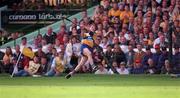14 September 1997; Jamesie O'Connor of Clare watches his shot sail over the crossbar to score his side's winning point during the Guinness All Ireland Hurling Final match between Clare and Tipperary at Croke Park in Dublin. Photo by Ray McManus/Sportsfile