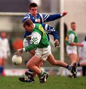 25 January 1998; Kevin O'Brien of Leinster is tackled by Liam Flaherty of Munster during the Interprovincial Railway Cup Football Championship Semi-Final match between Munster and Leinster at Fitzgerald Stadium in Killarney, Kerry. Photo by Ray McManus/Sportsfile