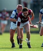 25 May 1997; Liam Burke of Galway in action against Ray Fogarty of Laois during the Church & General National Hurling League Division 1 match between Galway and Laois at Kenny Park in Athenry, Galway. Photo by Ray McManus/Sportsfile