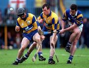 10 May 1997; Liam McGrath of Tipperary in action against Frank Lohan, left, and Ollie Baker of Clare during the National Hurling League Division 1 match between Clare and Tipperary at Cusack Park in Ennis. Photo by Ray McManus/Sportsfile