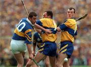 14 September 1997; Liam McGrath of Tipperary in action against Anthony Daly and Ollie Baker of Clare during the Guinness All Ireland Hurling Final match between Clare and Tipperary at Croke Park in Dublin. Photo by Ray McManus/Sportsfile