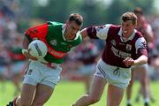 25 May 1997; John Casey of Mayo in action against Gary Fahey of Galway during the GAA Football Senior Championship Quarter-Final match between Galway and Mayo at Tuam Stadium in Tuam, Galway. Photo by Ray McManus/Sportsfile