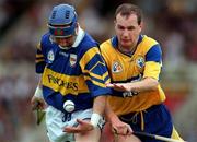 6 July 1997; John Leahy of Tipperary in action against Liam Doyle of Clare during the GAA Munster Senior Hurling Championship Final match between Clare and Tipperary at Páirc Uí Chaoimh in Cork. Photo by Ray McManus/Sportsfile