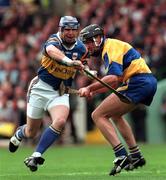 14 September 1997; John Leahy of Tipperary in action against Sean McMahon of Clare during the Guinness All Ireland Hurling Final match between Clare and Tipperary at Croke Park in Dublin. Photo by Ray McManus/Sportsfile