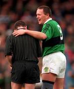 22 February 1998; Johnny Barr of Erin's Isle is booked by referee Pat McEnaney after a tackle on Alan Crowley of Castlehaven during the AIB All-Ireland Club Senior Football Semi-Final match between Erin's Isle and Castlehaven at Semple Stadium in Thurles, Tipperary. Photo by Ray McManus/Sportsfile