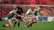 17 March 1998; Michael McGrath of Sarsfields in action against Daithi Regan, left, and Johnny Pilkington of Birr in action against Brendan Cooney of Sarsfields during the All-Ireland Club Hurling Final between Sarsfields and Birr at Croke Park, Dublin. Photo by Brendan Moran/Sportsfile