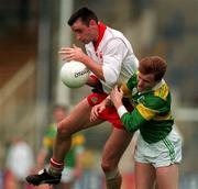 16 April 1995; Matt McGleenan of Tyrone in action against Billy O'Shea of Kerry during the Church & General National Football League Quarter-Final match between Tyrone and Kerry at Croke Park in Dublin. Photo by Brendan Moran/Sportsfile