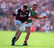 25 May 1997; Michael Donnelan of Galway in action against Colm McMenamon Mayo during the GAA Football Senior Championship Quarter-Final match between Galway and Mayo at Tuam Stadium in Tuam, Galway. Photo by Ray McManus/Sportsfile