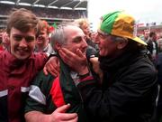 17 March 1998; Birr manager P.J Whelahan is congratulated by fans following the All-Ireland Club Hurling Final between Sarsfields and Birr at Croke Park, Dublin. Photo by David Maher/Sportsfile