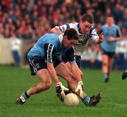 15 February 1998; Darren Swift of Monaghan in action against Paddy Christie of Dublin during the Church & General National Football League match between Dublin and Monaghan at Parnell Park in Dublin. Photo by Brendan Moran/Sportsfile