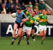 15 March 1998; Paul Bealin of Dublin in action against William Kirby of Kerry celebrates during the National Football League Section C match between Dublin and Kerry at Parnell Park in Dublin. Photo by Brendan Moran/Sportsfile