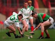 17 March 1998; Peter Kelly of Sarsfields in action against Brian whelahan of Birr during the All-Ireland Club Hurling Final between Sarsfields and Birr at Croke Park, Dublin. Photo by Brendan Moran/Sportsfile