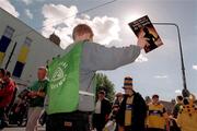 14 September 1997; A young programme seller on Jones' Road prior to the Guinness All Ireland Hurling Final match between Clare and Tipperary at Croke Park in Dublin. Photo by Brendan Moran/Sportsfile