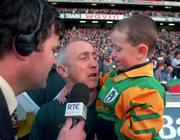 29 September 1996; Meath manager Sean Boylan, with his son, is  interviewed by Brian Carthy after the final whistle of the All-Ireland Football Final Replay maych between Meath and Mayo at Croke Park in Dublin. Photo by David Maher/Sportsfile