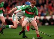 17 March 1998; Simon Whelahan of Birr in action against Peter Cooney of Sarsfields during the All-Ireland Club Hurling Final between Birr and Sarsfields at Croke Park, Dublin. Photo by David Maher/Sportsfile