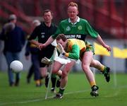 17 March 1998; Aidan Fahy of Corofin in a race for possession against Tony Gorman of Erin's Isle during the All-Ireland Club Football Final between Corofins and Erin's Isle at Croke Park in Dublin. Photo by Brendan Moran/Sportsfile