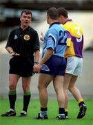 11 June 2000; Referee Pat McEnaney speaks to Vinny Murphy of Dublin and Sean O'Shaughnessy of Wexford during the Bank of Ireland Leinster Senior Football Championship Quarter-Final match between Dublin and Wexford at Croke Park in Dublin. Photo by Brendan Moran/Sportsfile