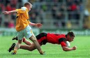 28 May 2000; Shane Ward of Down in action against Enda McHernon of Antrim during the Bank of Ireland Ulster Senior Football Championship Quarter-Final between Antrim and Down at Casement Park in Belfast, Antrim. Photo by David Maher/Sportsfile